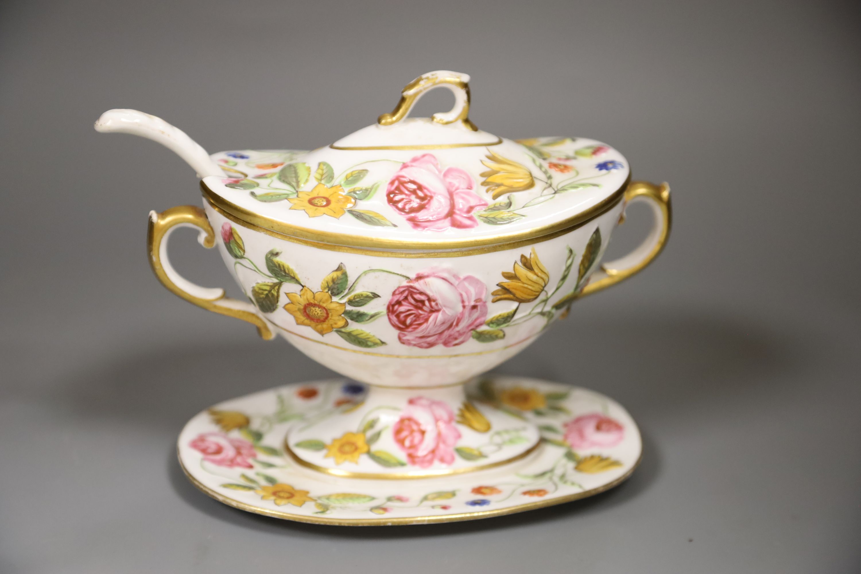 An English porcelain floral moulded tureen cover and ladle, probably Coalport, height 15cm